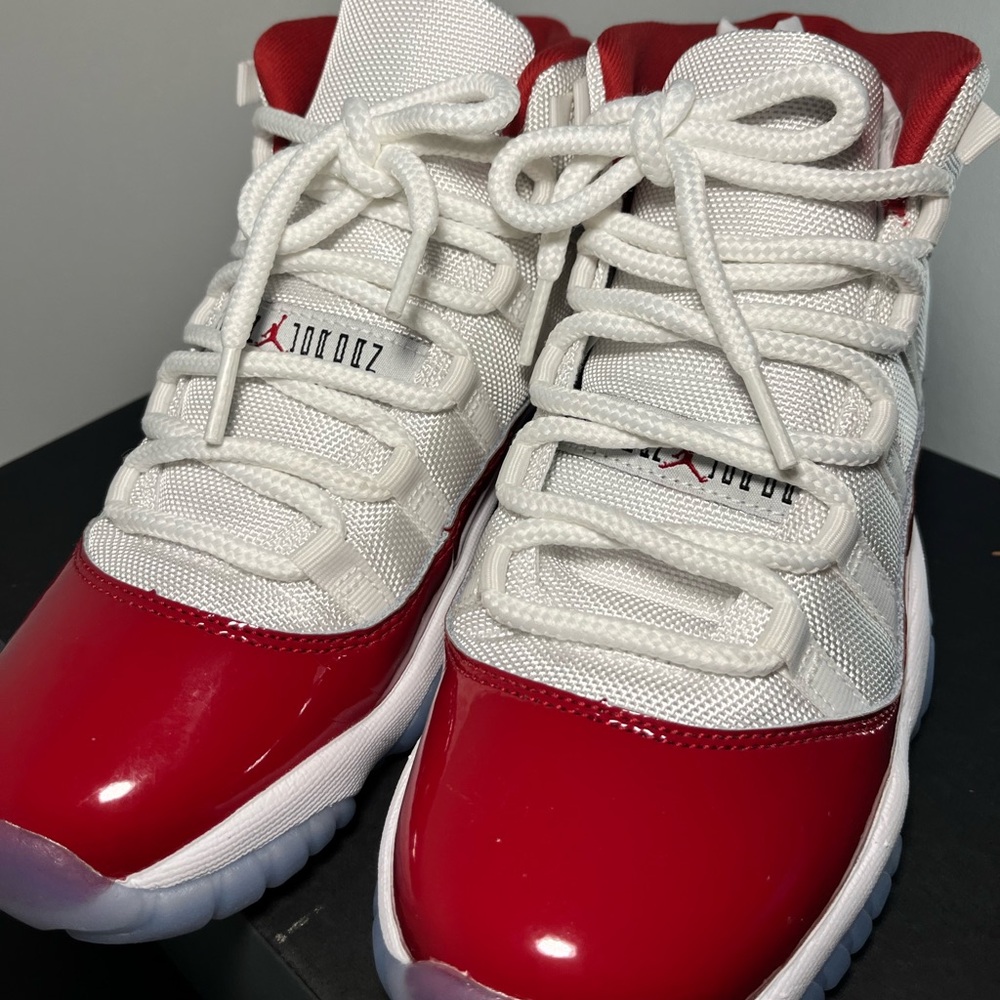 Jordan 11s Cherry red.